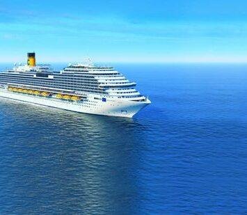 A large costa cruise ship sails smoothly across a vast, calm ocean under a clear blue sky, conveying a sense of adventure and tranquility.