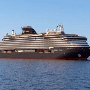 A Greek isle explora large, elegant cruise ship sails in calm, blue waters under a clear sky. The ship exudes luxury with its sleek design and multiple decks.