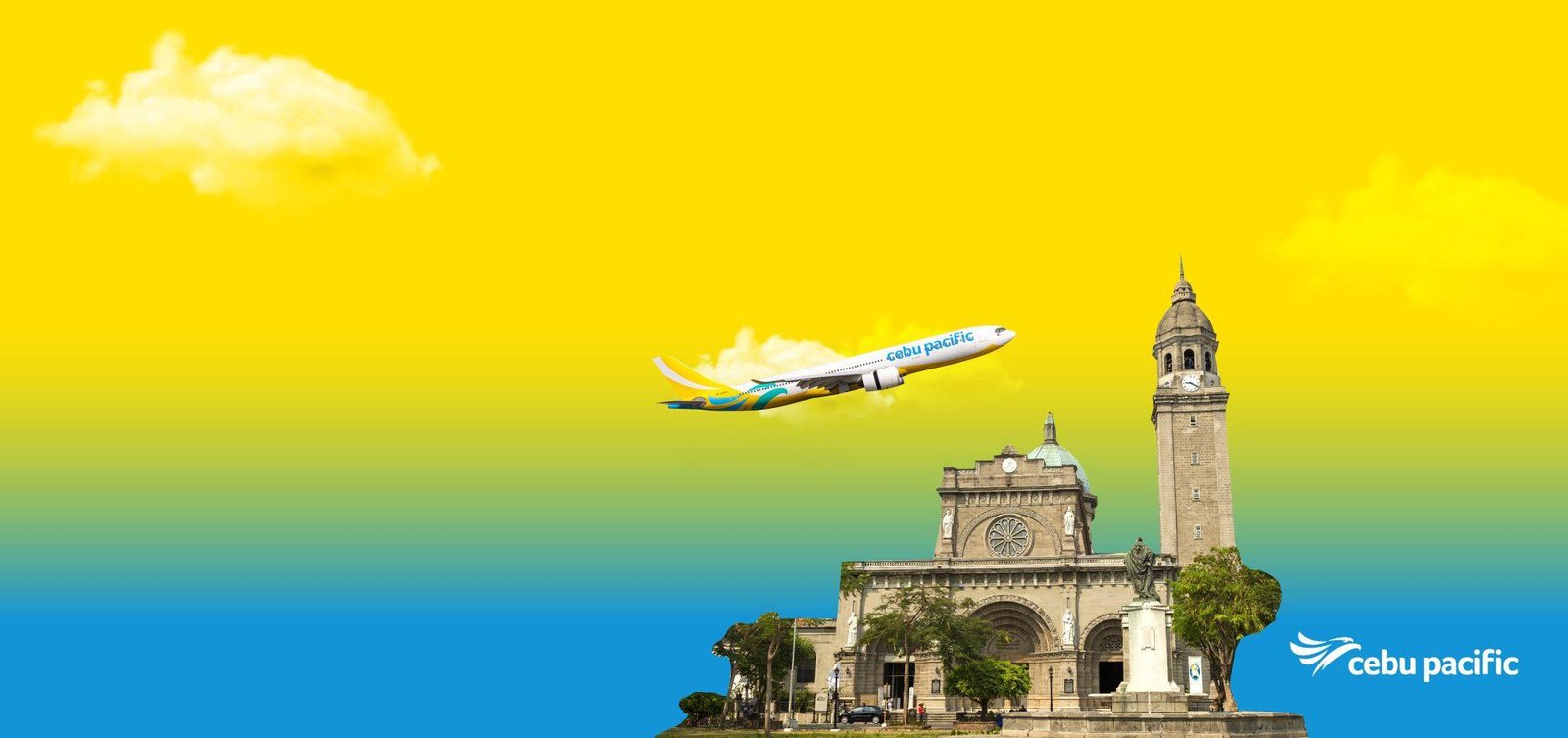 Cebu Pacific airplane flying above the Manila Cathedral in the Philippines
