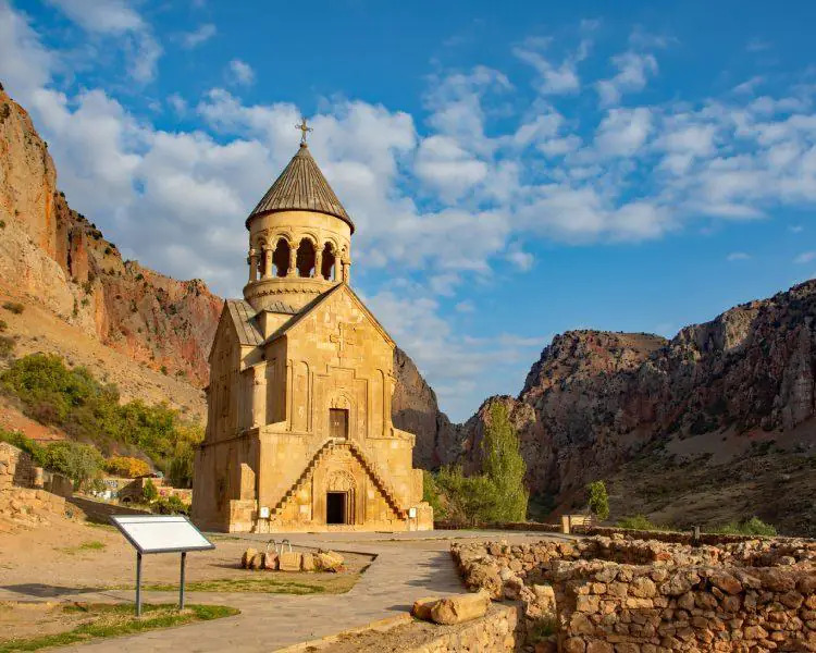Noravank Monastery nestled in a red rock canyon in Armenia