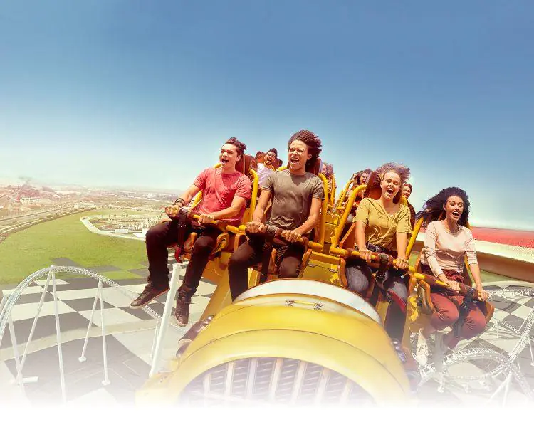 Visitors having fun on thrilling rides at Ferrari World Abu Dhabi